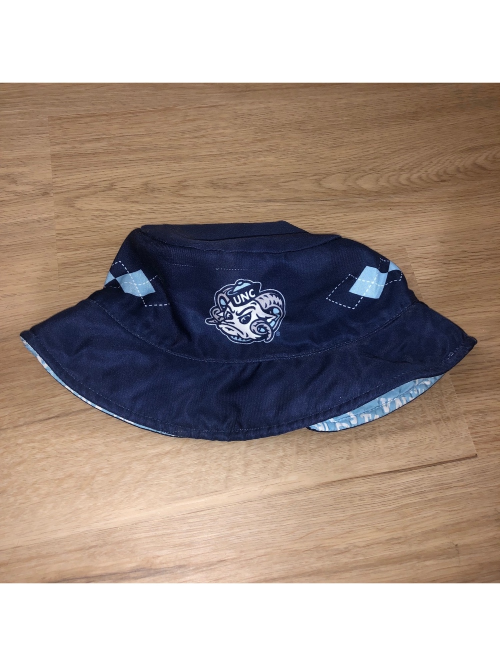 UNIVERSITY OF NORTH CAROLINA TAR HEELS REVERSIBLE BUCKET HAT BLUE ONE SIZE ADULT